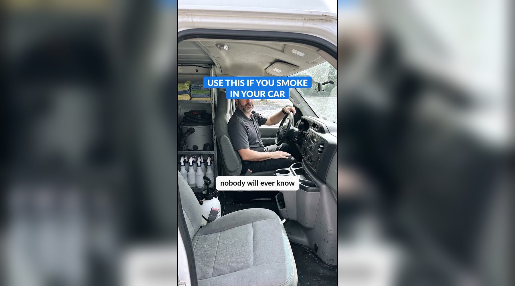 An AI-made detailer character sitting in the driver's seat of a work van with cleaning supplies on the shelves behind him